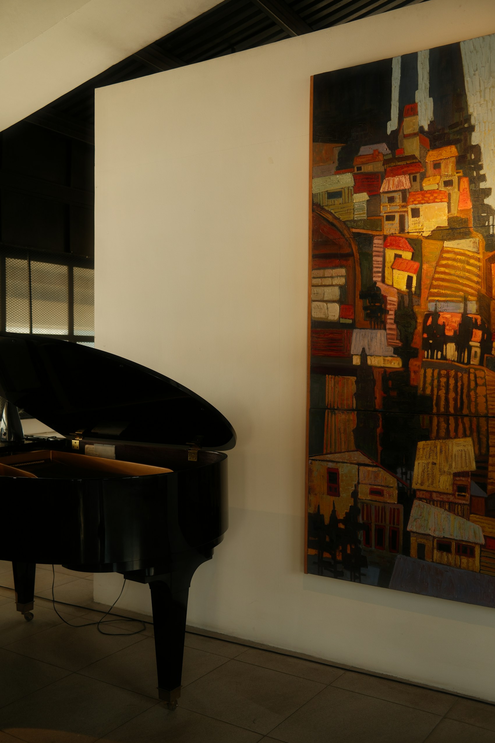 A grand piano in an elegant room, moved by McCrea's